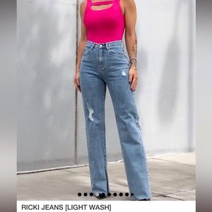 Jeans - By Egreis, size L, never worn. Slit at bottom